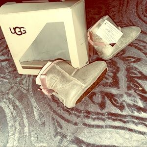 Ugg” Pretty Girl Pink/Gold Size 2/3 infant.